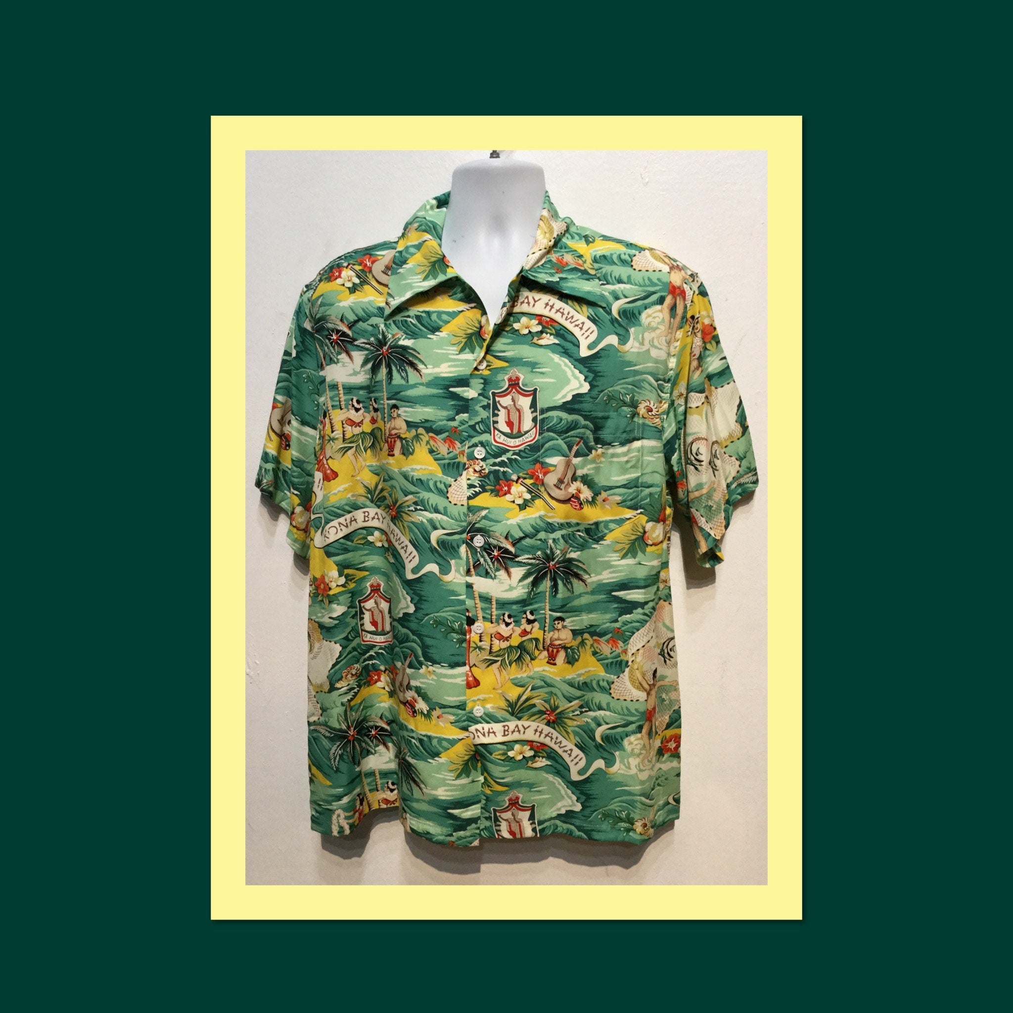 1940s vintage reproduction land of aloha shirt by Kona Bay. Size medium, large.